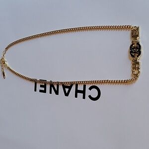 CHANEL Gold and Black Logo Charm